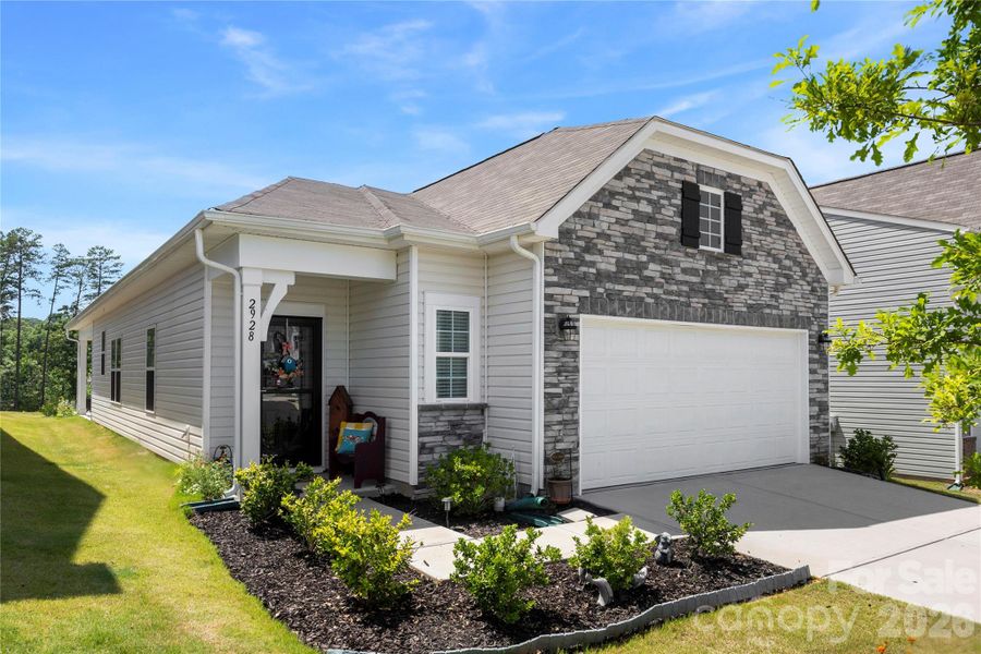 Front exterior of a new home in Legacy Ridge, Catawba, NC, highlighting curb appeal (Image 2). Front exterior of a new home in Legacy Ridge, Catawba, NC, highlighting curb appeal (Image 2).