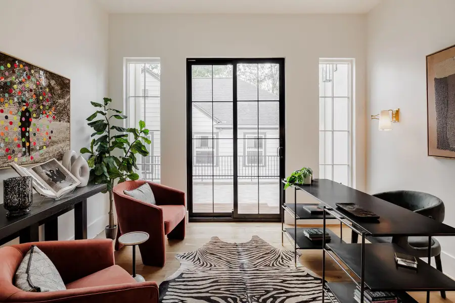 A private retreat framed by pocket doors and natural light, ideal for focused work, creative thought, or quiet moments away from the day’s rhythm features a separate entrance, and conveniently located off of the mud room. A private retreat framed by pocket doors and natural light, ideal for focused work, creative thought, or quiet moments away from the day’s rhythm features a separate entrance, and conveniently located off of the mud room.