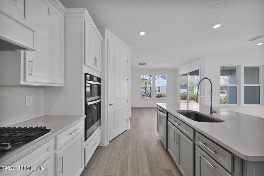 Furnished interior view inside a new home in Del Webb Wildlight, Yulee (Image 12).