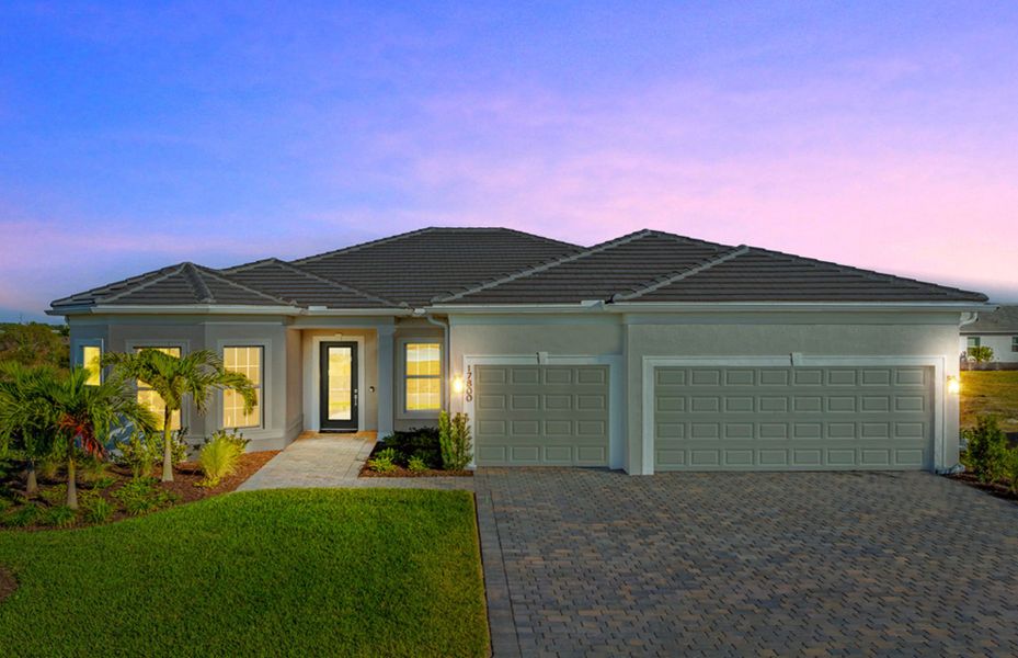 Front exterior of a new home in Del Webb Oak Creek, North Fort Myers, FL, highlighting curb appeal (Image 29).