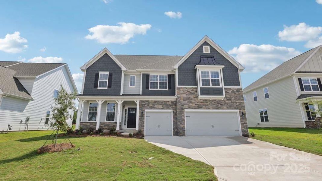 Front exterior of a new home in Sylvan Creek, Denver, NC, highlighting curb appeal (Image 20).