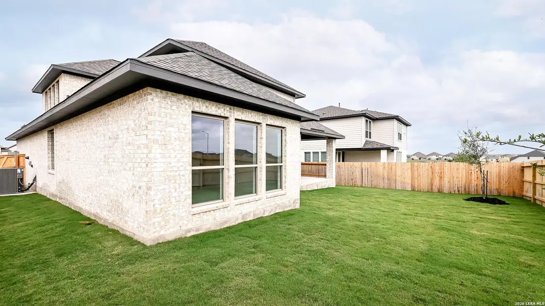 Exterior details and patio area of a home in The Parklands, Schertz (Image 4).