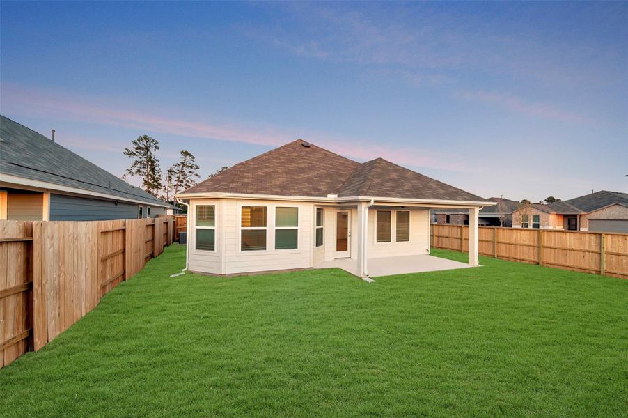 Exterior details and patio area of a home in Moran Ranch, Willis (Image 23).