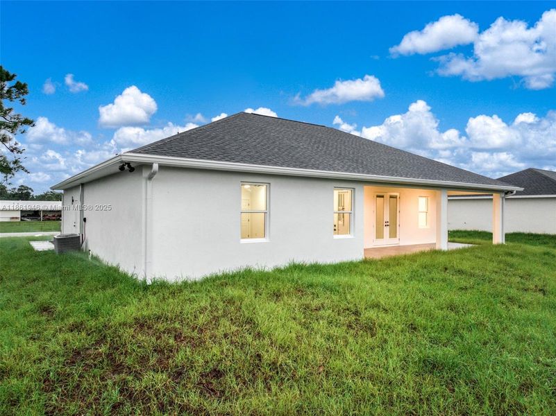 Front exterior of a new home in , Sebring, FL, highlighting curb appeal (Image 26).