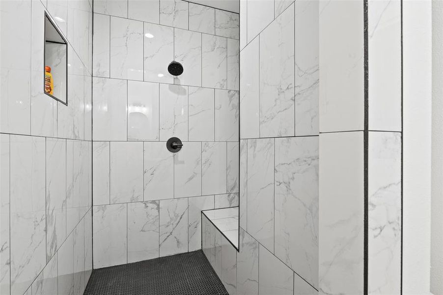 Bathroom with a tile shower