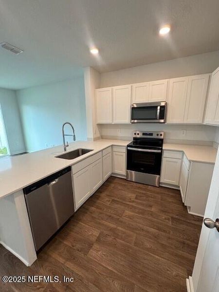 Furnished interior view inside a new home in The Landing, Middleburg (Image 14).