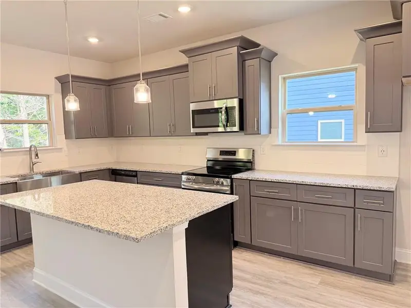 Furnished interior view inside a new home in Magnolia Villas, Cornelia (Image 8).