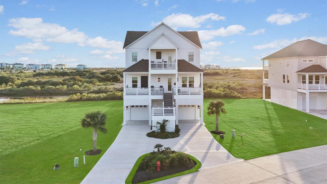 This custom built home by Sapphire Sea Homes is three stories and offers 5 bedrooms and 5.5 bathrooms. Ideal for families or a rental investment property