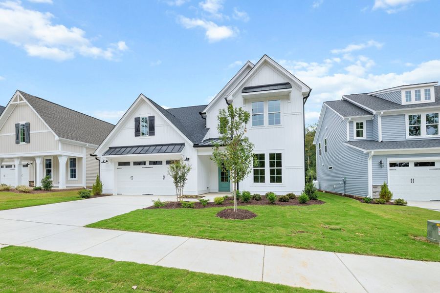 Representative exterior photo of a completed home built from the The Whitley by RobuckHomes in Kennebec Crossing, Angier, NC (Image 42). Representative exterior photo of a completed home built from the The Whitley by RobuckHomes in Kennebec Crossing, Angier, NC (Image 42).