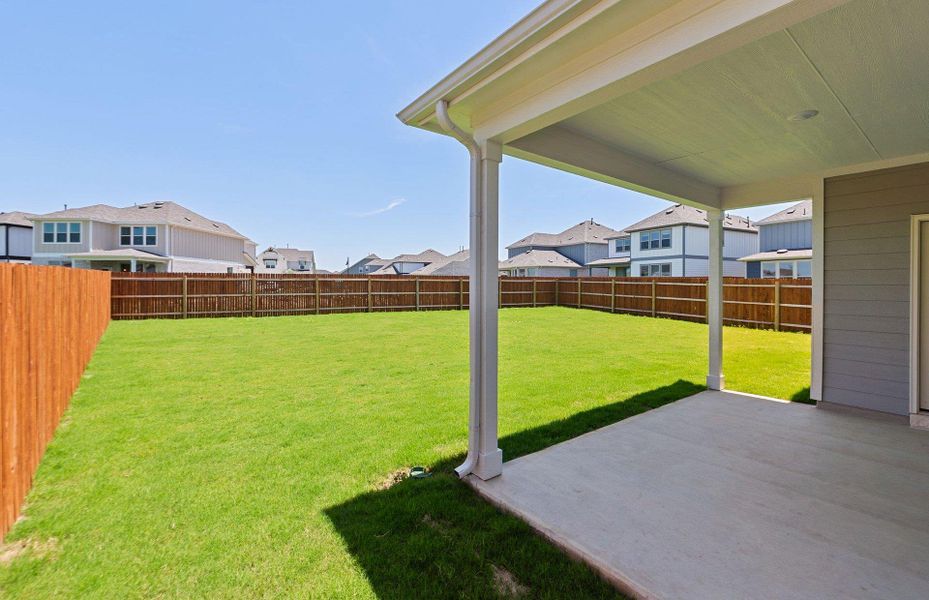 Exterior details and patio area of a home in Santa Rita Ranch, Liberty Hill (Image 24).