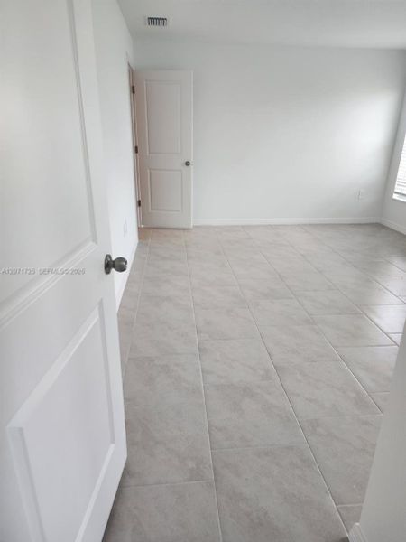 Spacious, unfurnished interior of a new home in , Lehigh Acres (Image 17). Spacious, unfurnished interior of a new home in , Lehigh Acres (Image 17).