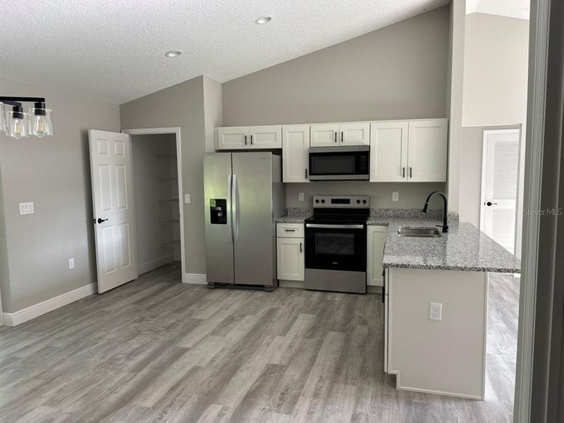 Furnished interior view inside a new home in , Dunnellon (Image 6).