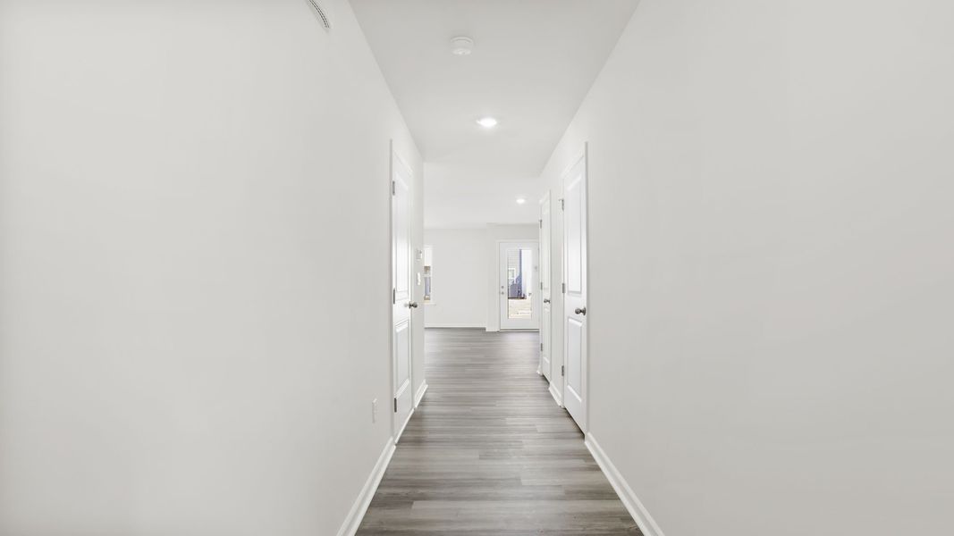 Spacious, unfurnished interior of a new home in Tanglewood Townes, Greenville (Image 12).