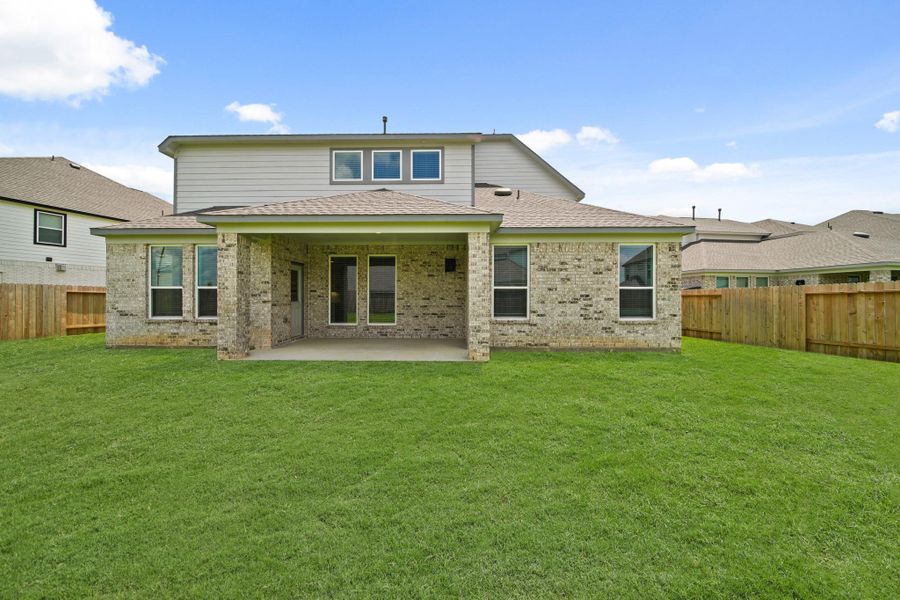 Front exterior of a new home in Beacon Hill, Waller, TX, highlighting curb appeal (Image 17). Front exterior of a new home in Beacon Hill, Waller, TX, highlighting curb appeal (Image 17).