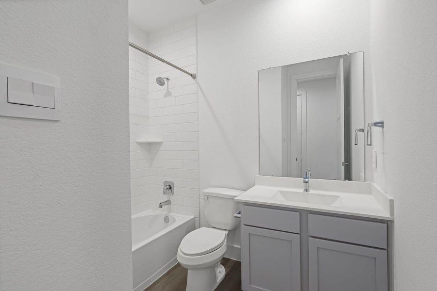 Furnished interior view inside a new home in Hills of Westlake, Conroe (Image 6).