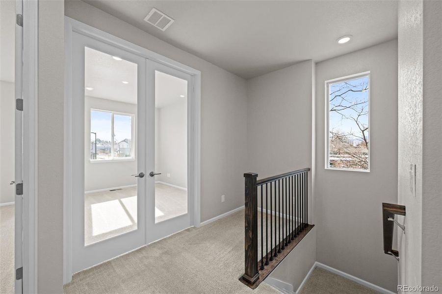 Spacious, unfurnished interior of a new home in Ralston Creek, Arvada (Image 20).