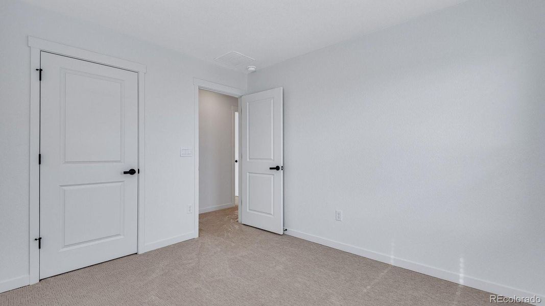 Spacious, unfurnished interior of a new home in Trails at Crowfoot, Parker (Image 31).