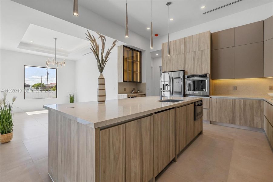 SPACIOUS ISLAND provide an ideal setting for everyday living and entertaining.