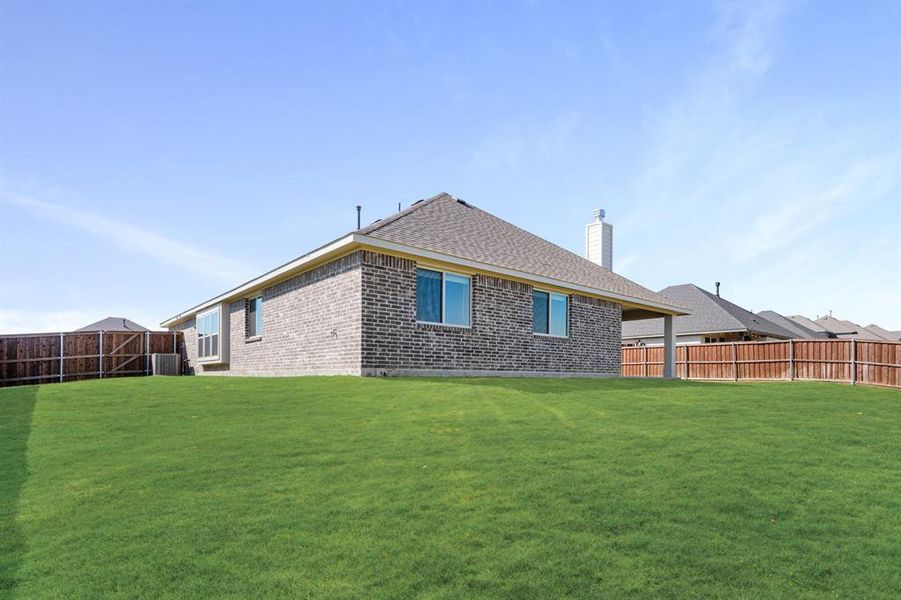 Exterior details and patio area of a home in Wildcat Ridge Phase 3, Godley (Image 3). Exterior details and patio area of a home in Wildcat Ridge Phase 3, Godley (Image 3).