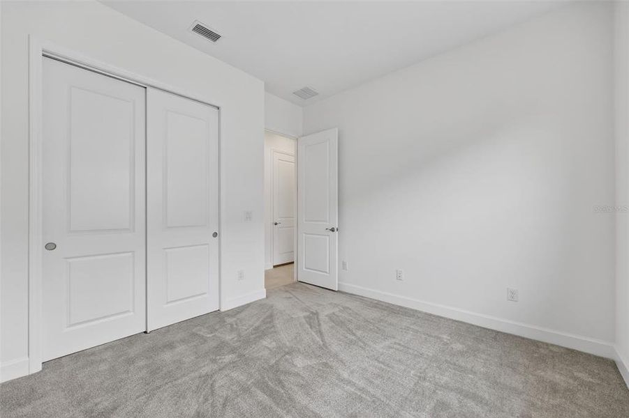 Spacious, unfurnished interior of a new home in Winding Ridge, Wesley Chapel (Image 33).