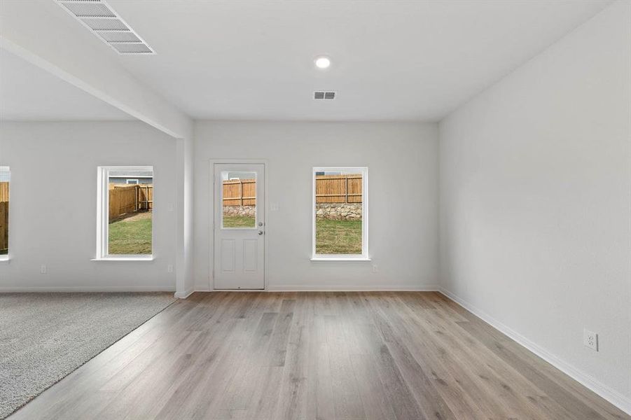 Dining room with wood-style floors