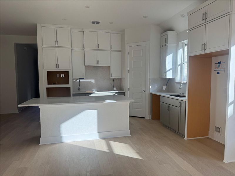 Furnished interior view inside a new home in Persimmon, Buda (Image 4).