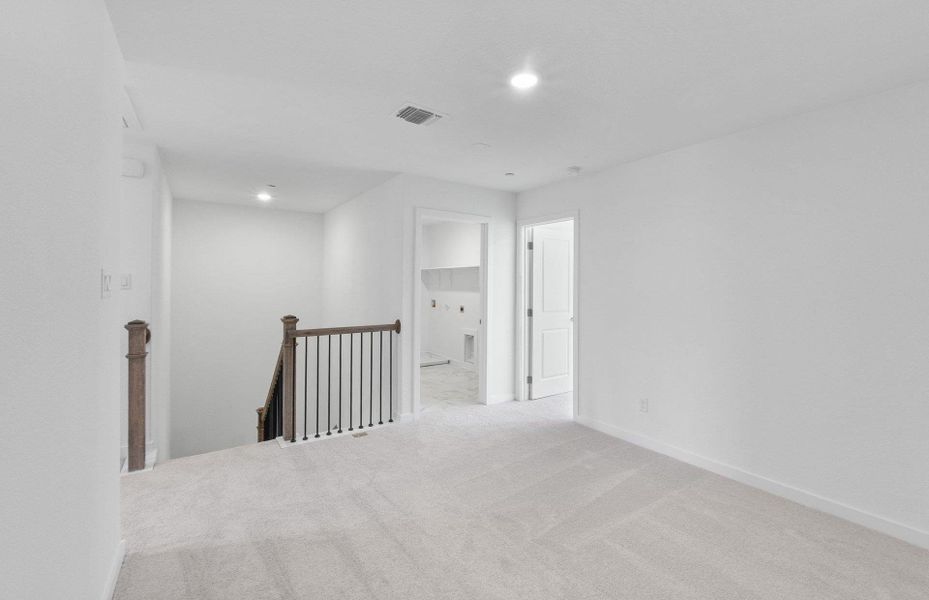Spacious, unfurnished interior of a new home in Monarch on Main, Round Rock (Image 13).