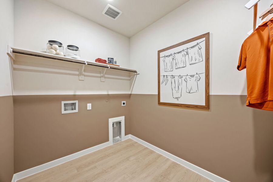 A room with a shelf and a wall with a sign on it. A room with a shelf and a wall with a sign on it.