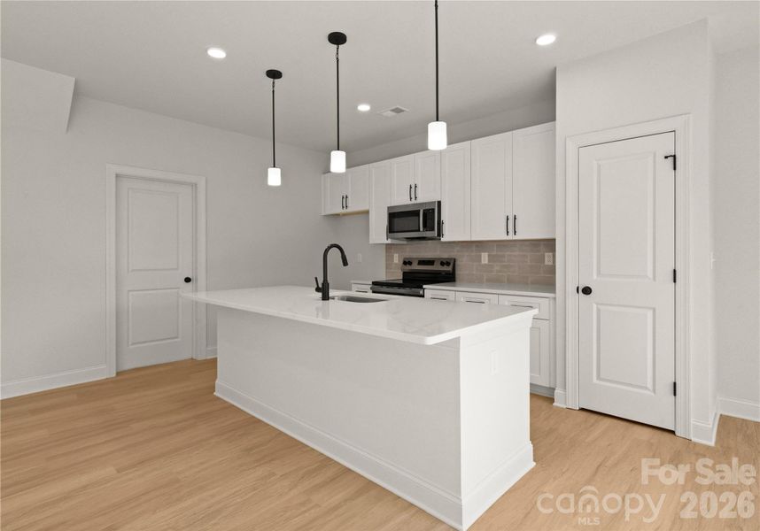 Furnished interior view inside a new home in , Charlotte (Image 33).