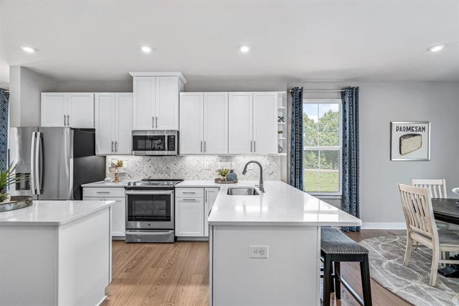 Representative furnished interior of a home built from the Clarendon 4 Story by Ryan Homes in Ashmore Square, Charlotte (Image 3).
