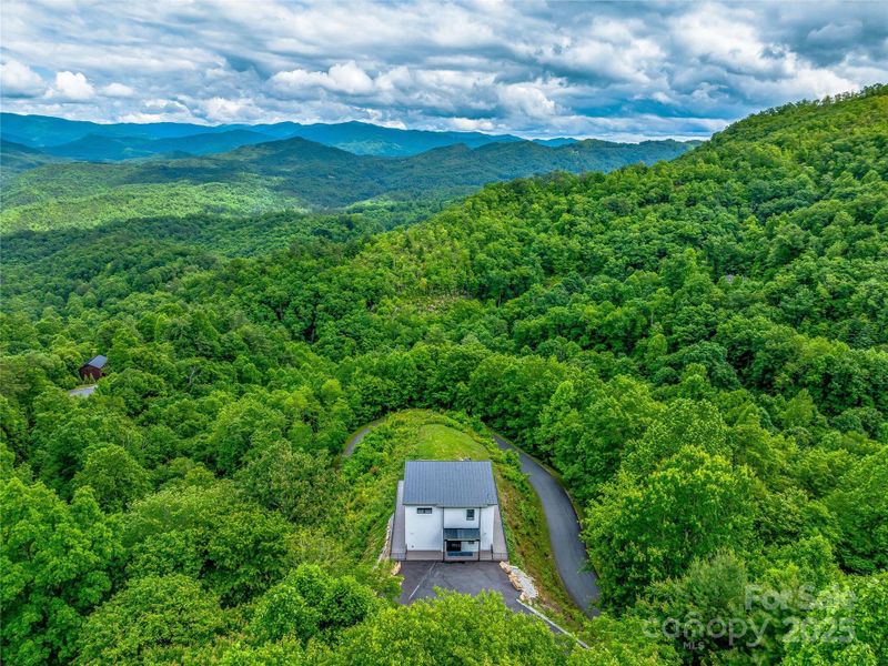Front exterior of a new home in , Bryson City, NC, highlighting curb appeal (Image 20).