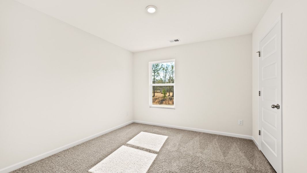 Representative unfurnished interior of a home built from the Flora by D.R. Horton in Poplar Preserve, Newnan (Image 14).