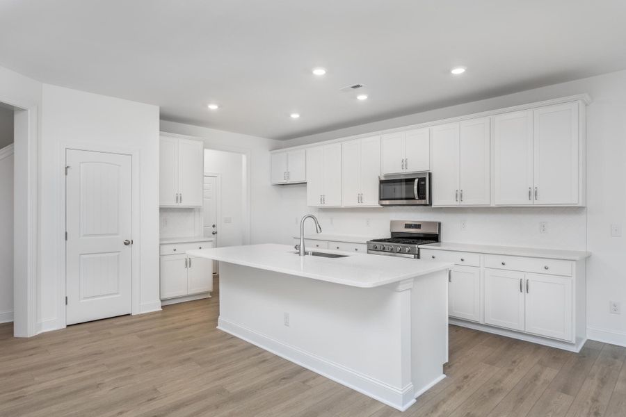 Furnished interior view inside a new home in Running Brook Townes, Durham (Image 6).
