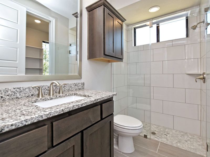 Representative furnished interior of a home built from the Avalon by Giddens Homes in Scofield Farms Estates, Georgetown (Image 102).