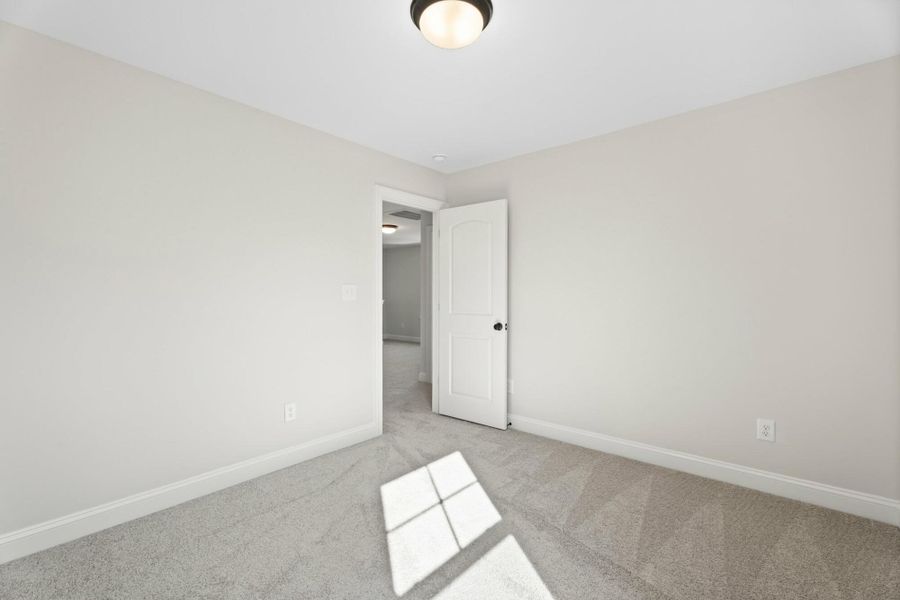 Spacious, unfurnished interior of a new home in Cottages at Piper Village, Trinity (Image 29).