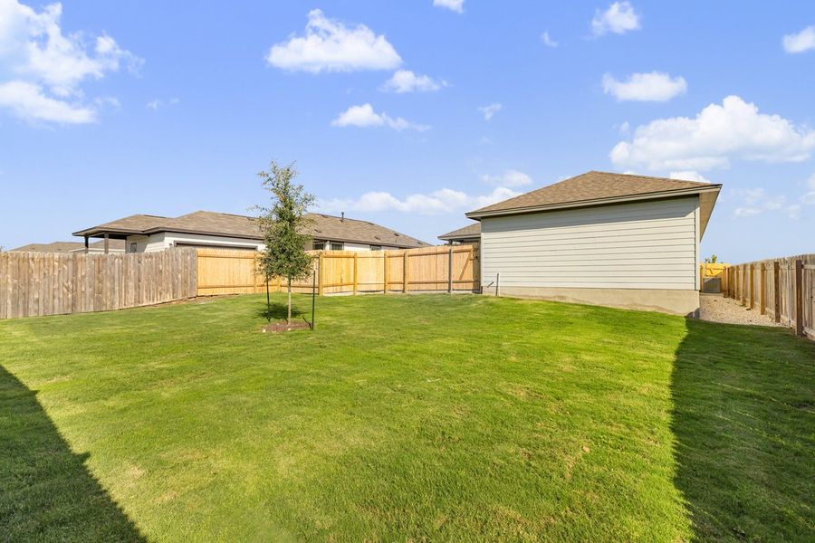 Exterior details and patio area of a home in Sage Hollow, Kyle (Image 28). Exterior details and patio area of a home in Sage Hollow, Kyle (Image 28).