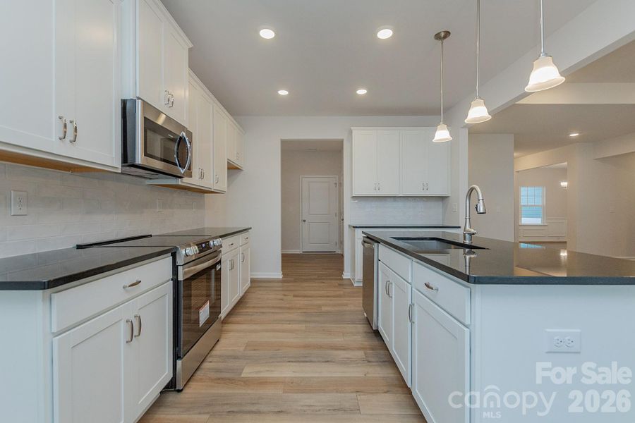 Furnished interior view inside a new home in Pine Bluff, Midland (Image 5).