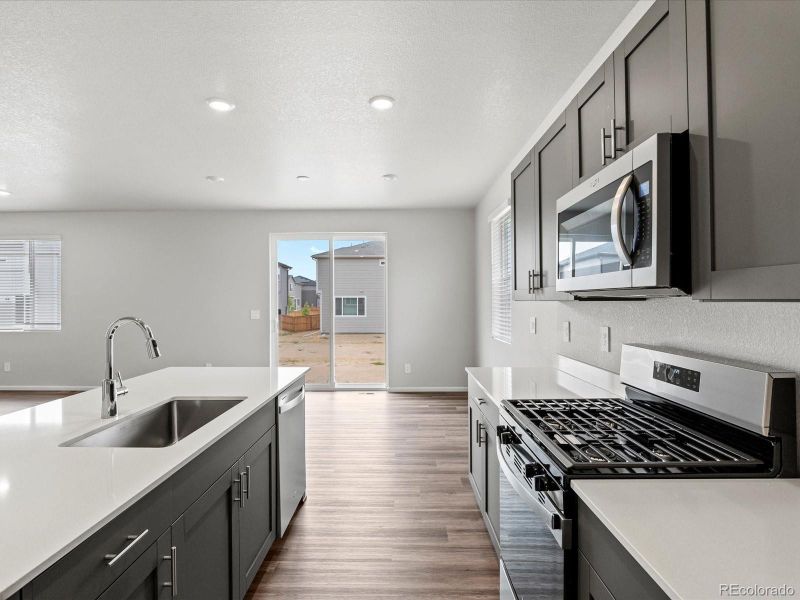 Furnished interior view inside a new home in Ridgeline Vista: The Flora Collection, Brighton (Image 9). Furnished interior view inside a new home in Ridgeline Vista: The Flora Collection, Brighton (Image 9).