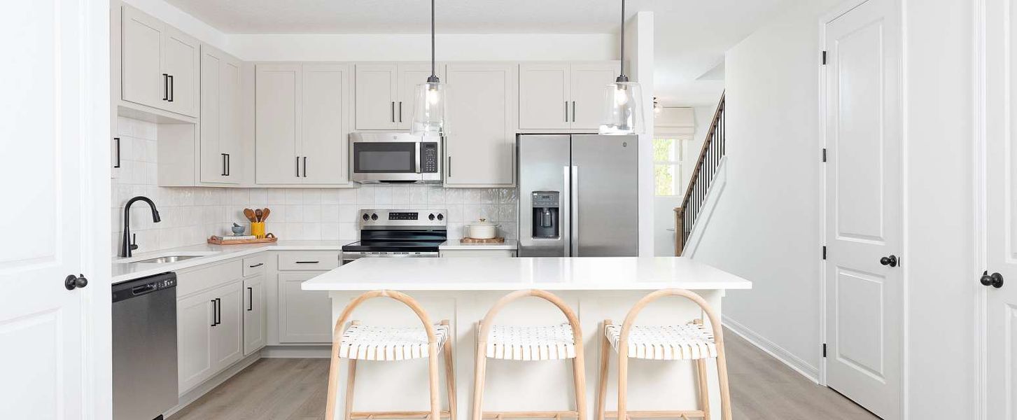 Representative furnished interior of a home built from the Surf by Ashton Woods in Catamaran Cove Townhomes, Rockledge (Image 9).