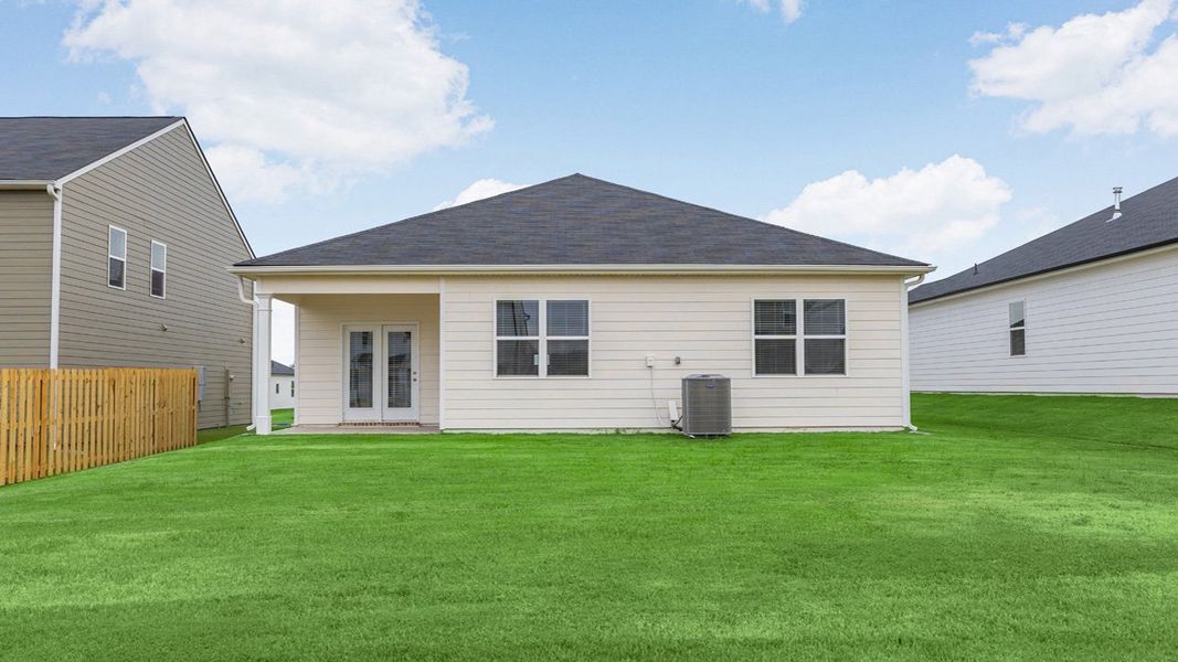 Exterior details and patio area of a home in Highland Hills, Graniteville (Image 3).