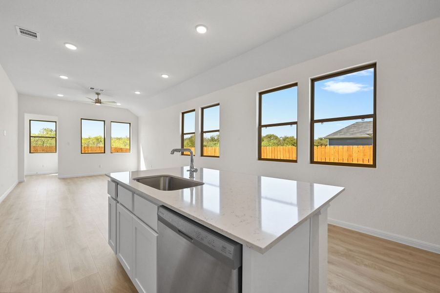 Kitchen in the Cedar home plan by Trophy Signature Homes – REPRESENTATIVE PHOTO