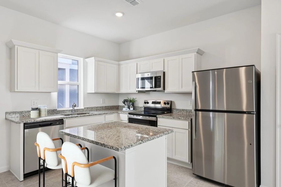 Representative furnished interior of a home built from the Keele by Starlight Homes in Hawks Run, Kissimmee (Image 5).
