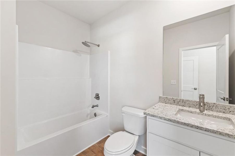 Furnished interior view inside a new home in Fern Dale, Fairburn (Image 11).