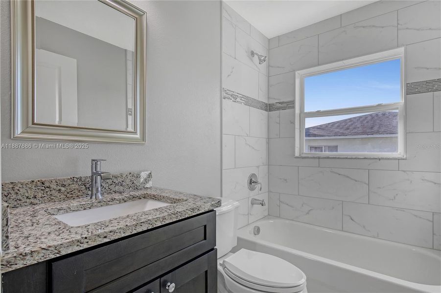 Furnished interior view inside a new home in , Port Charlotte (Image 1).