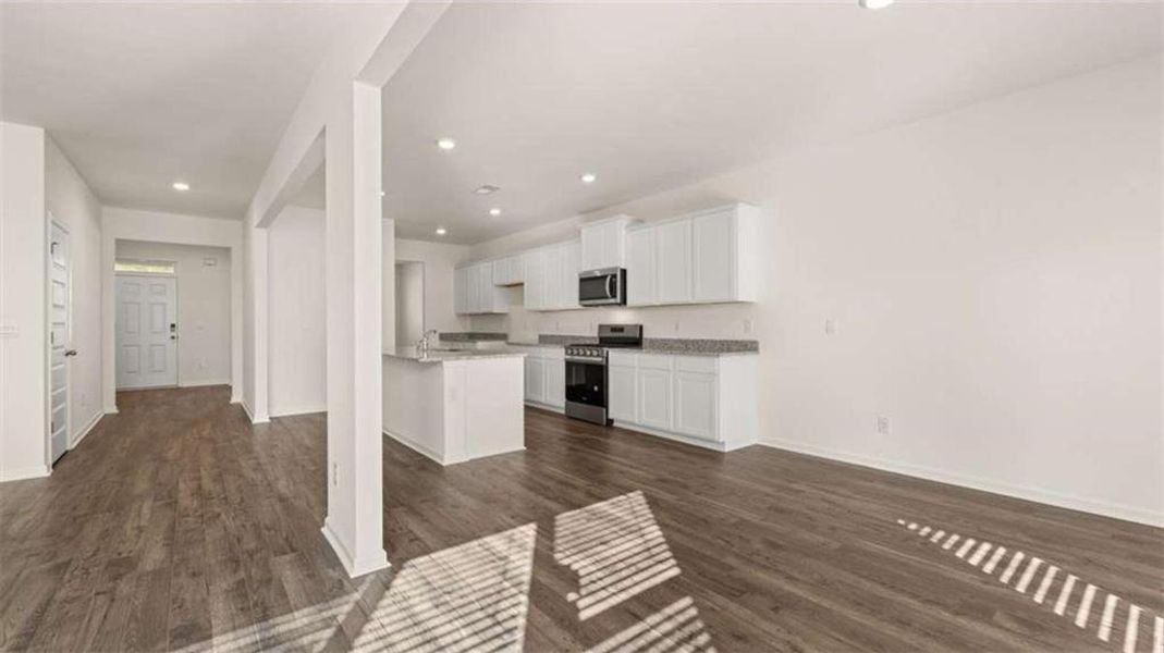 Furnished interior view inside a new home in , Dacula (Image 1).