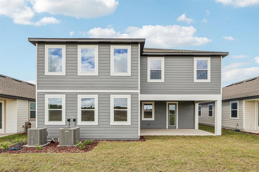 Exterior details and patio area of a home in Trailside, Mount Dora (Image 13).