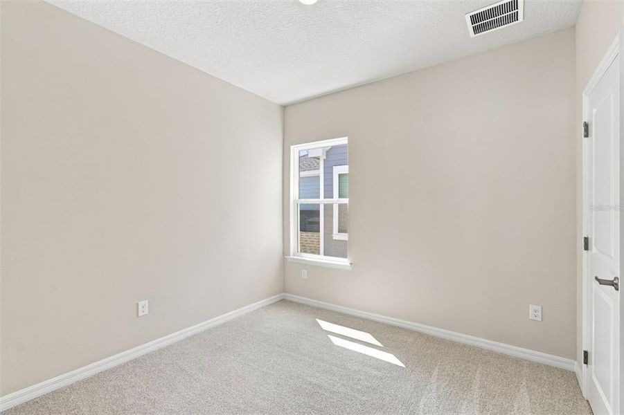Spacious, unfurnished interior of a new home in Laureate Park at Lake Nona - Garden Series, Orlando (Image 20).