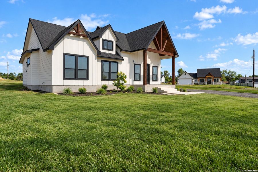 Front exterior of a new home in , Atascosa, TX, highlighting curb appeal (Image 22). Front exterior of a new home in , Atascosa, TX, highlighting curb appeal (Image 22).