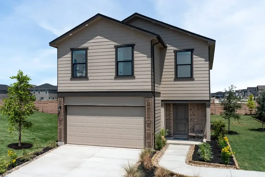 Representative exterior photo of a completed home built from the 2088 by KB Home in Espino, San Antonio, TX (Image 13).