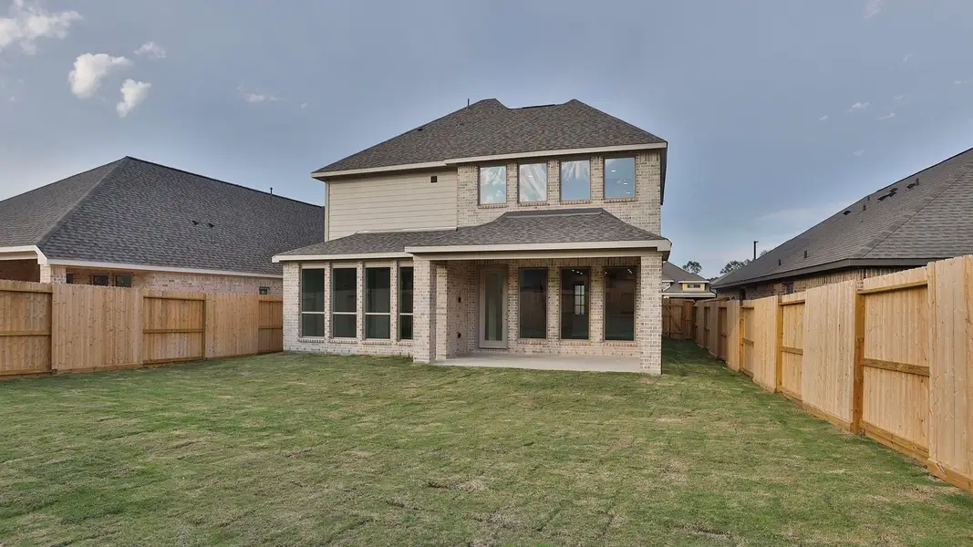 Exterior details and patio area of a home in The Highlands 45', Porter (Image 3).